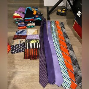 Lot of ties, pocket squares and dress socks. Some brand new others worn lightly